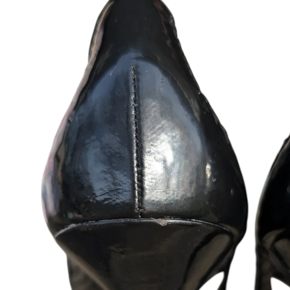 Jessica Simpson Black Perforated Pointed-Toe Stiletto Pumps